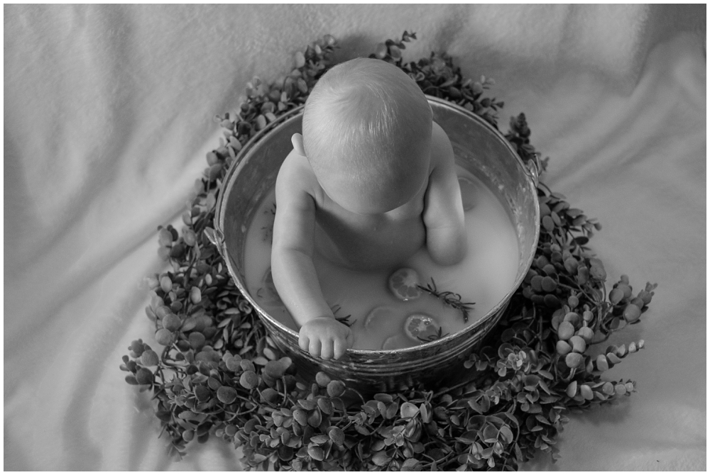 baby portraits in a milk bath, black and white