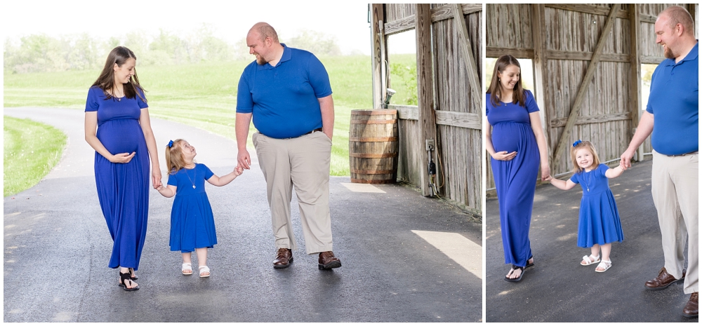 looking up at daddy during maternity portraits