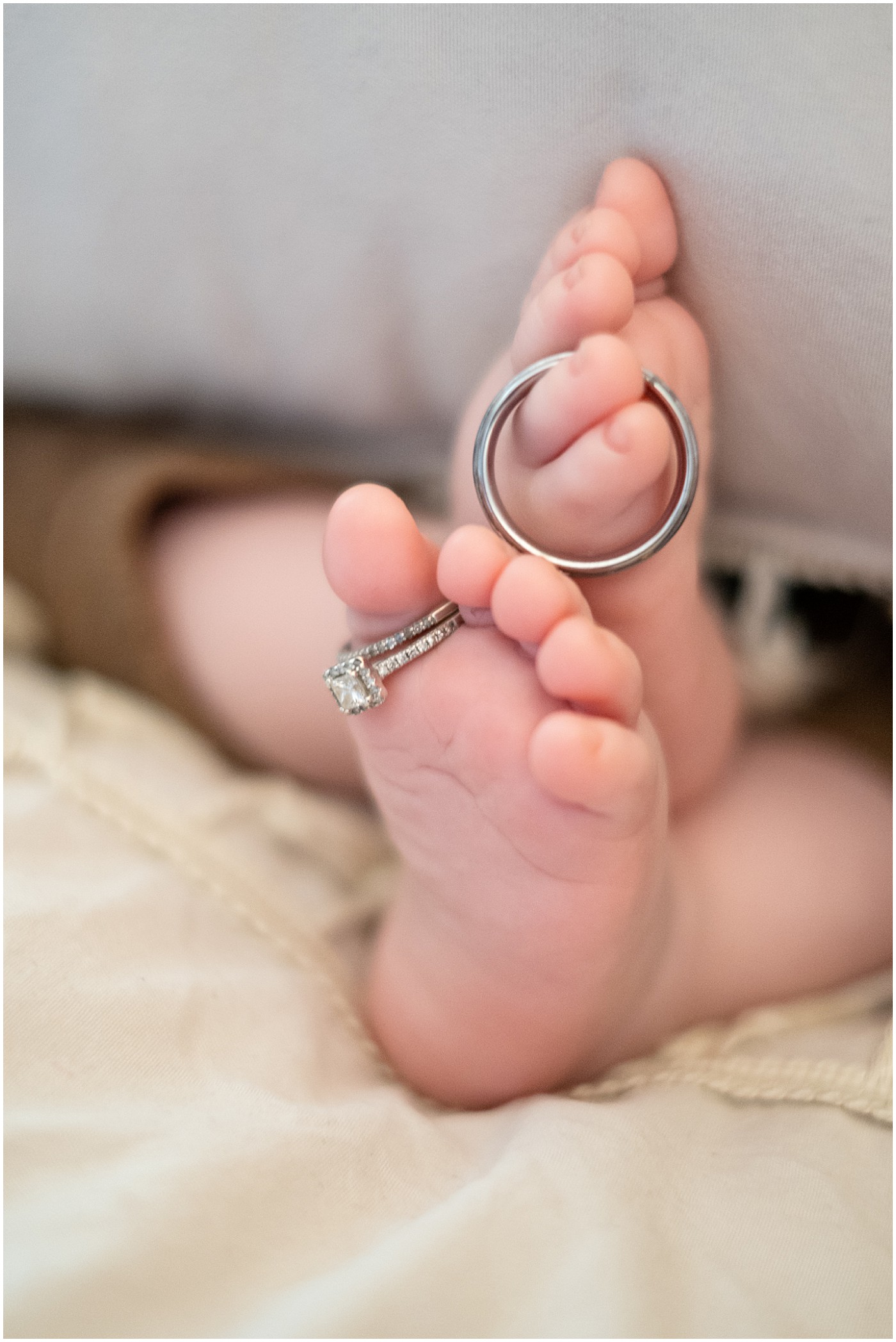 baby portraits with rings on feet