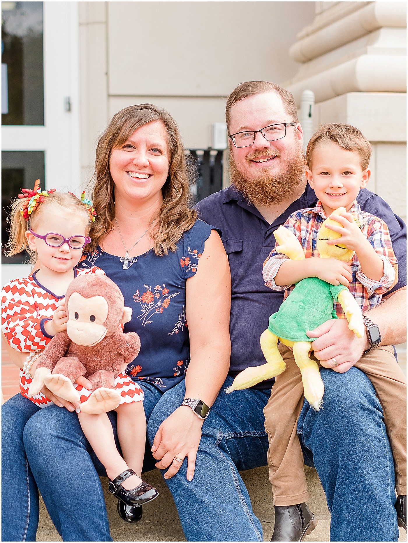 parents with their children on adoption day