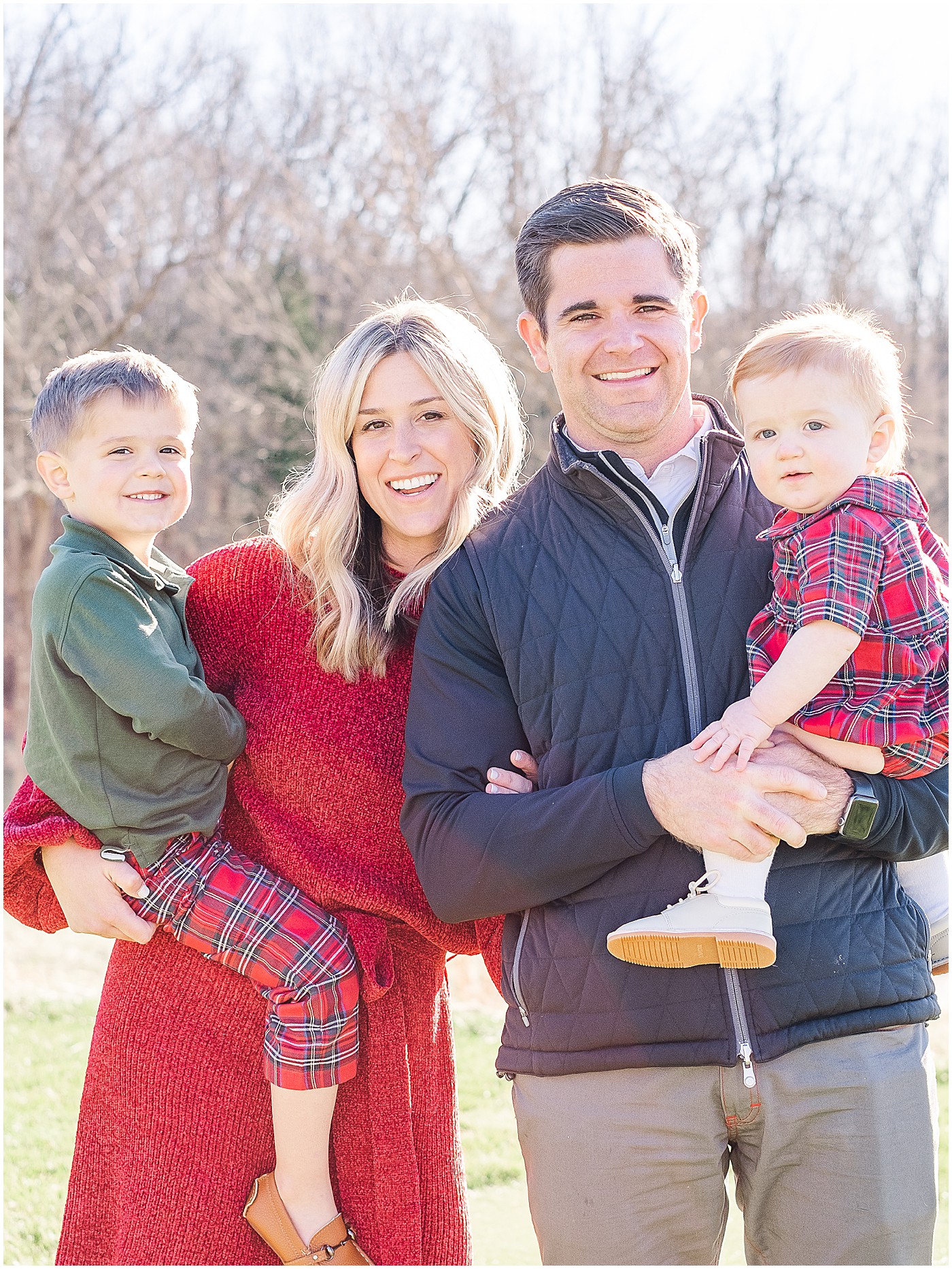 family of four on a golf course for winter portraits