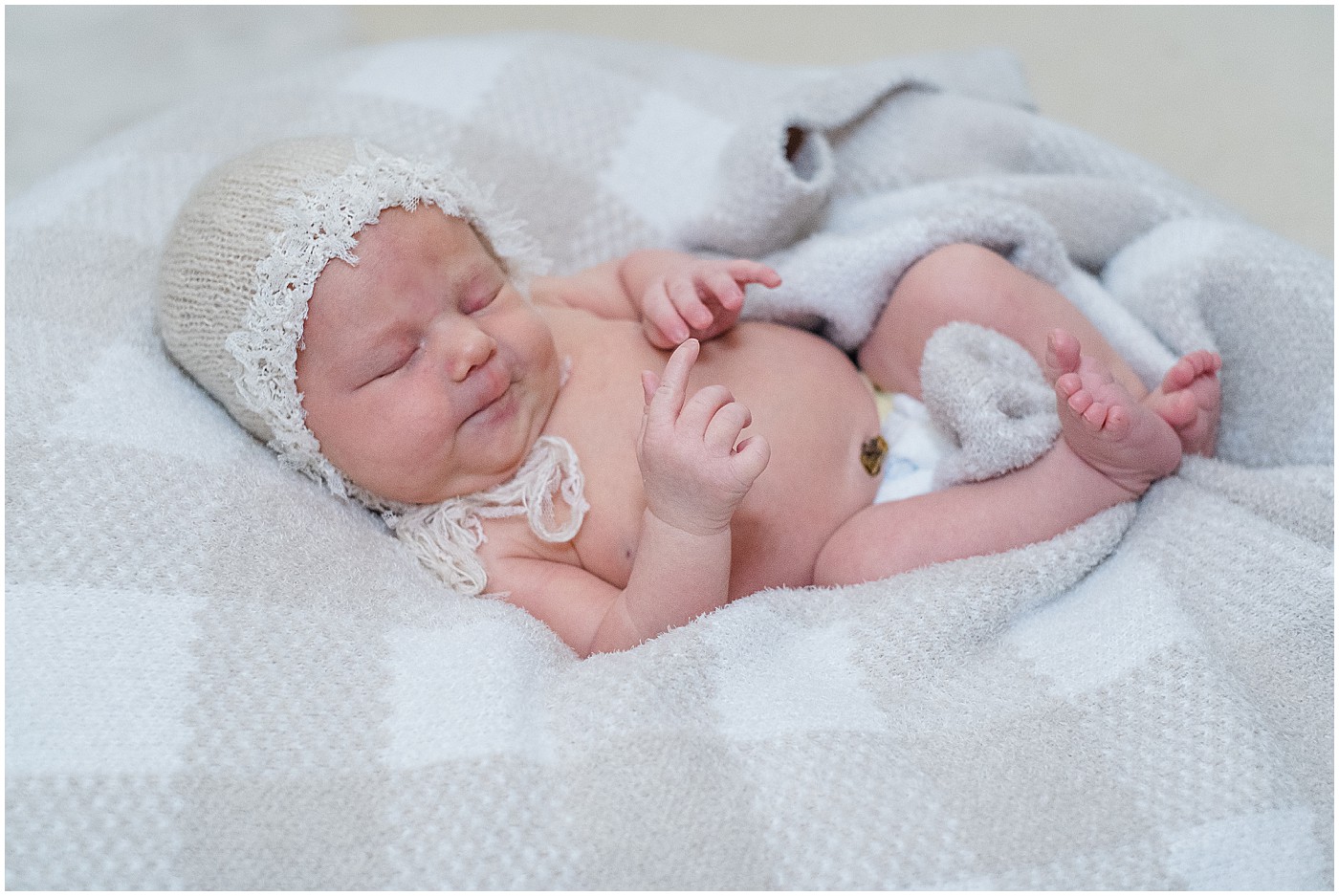 newborn with bonnet