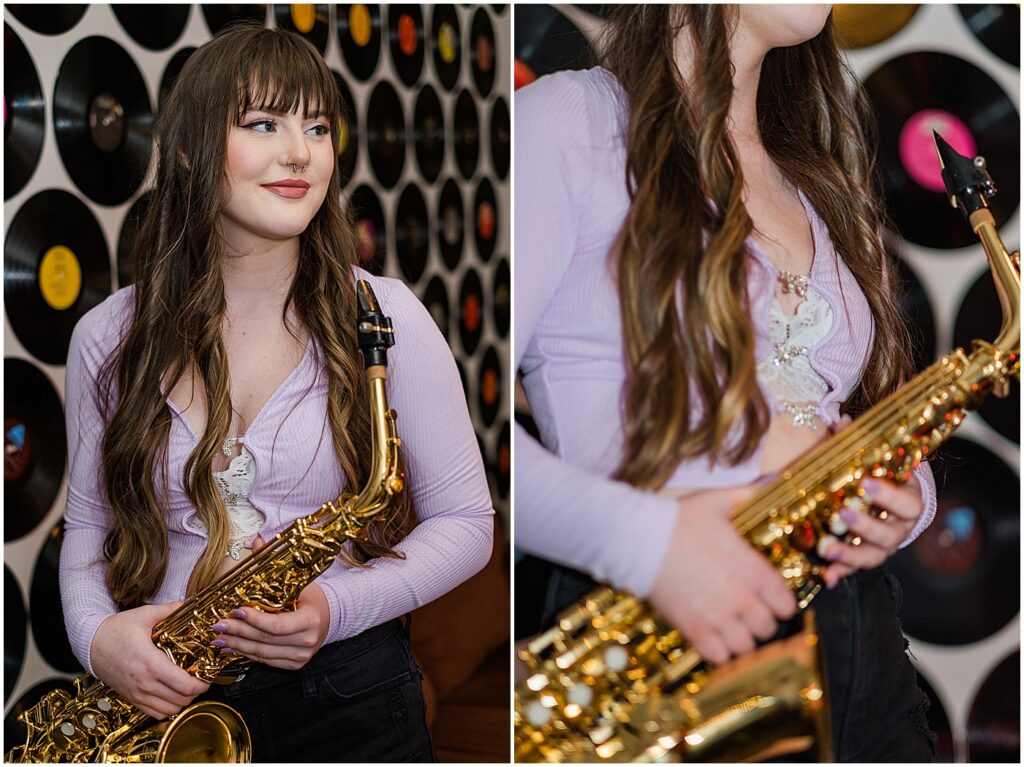 senior girl with saxophone in front of record wall