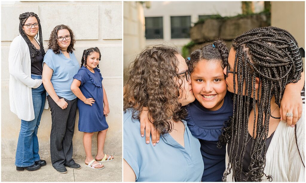 three sisters standing by each other and two oldest kissing the youngest