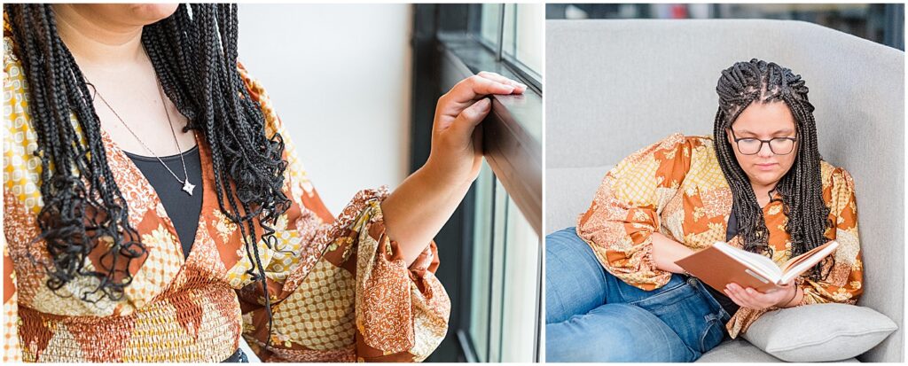 reading a book and looking out the window during her graduate portraits