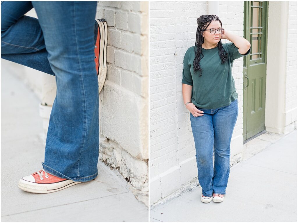 senior girl leaning against a white brick wall and closeup of her salmon colored tennis shoes