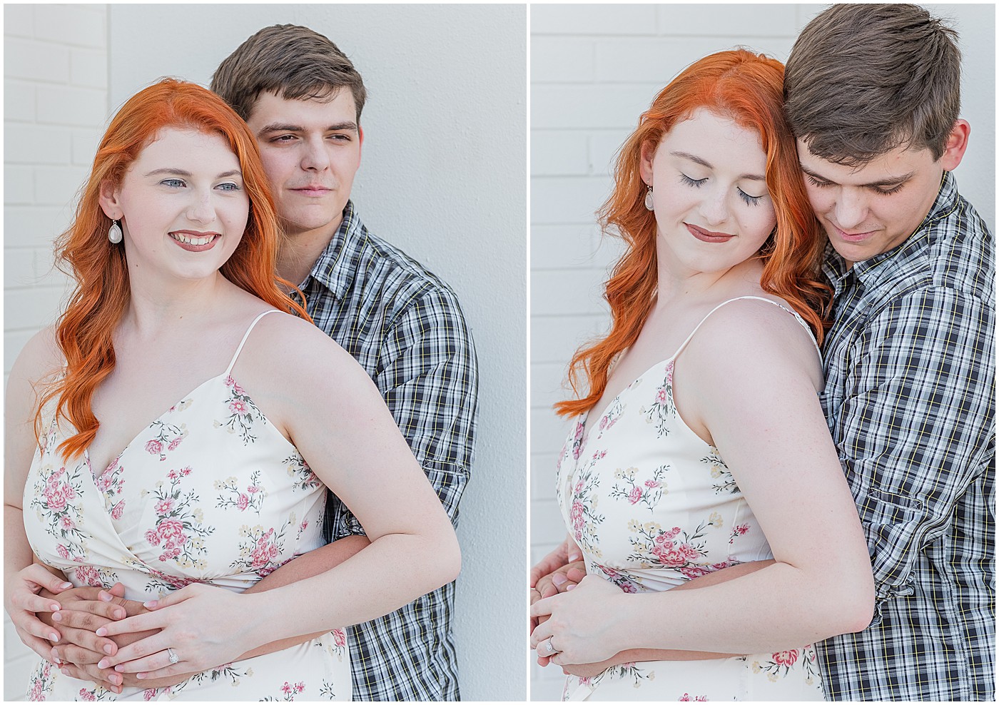 newly engaged couple embracing in front of a white wall