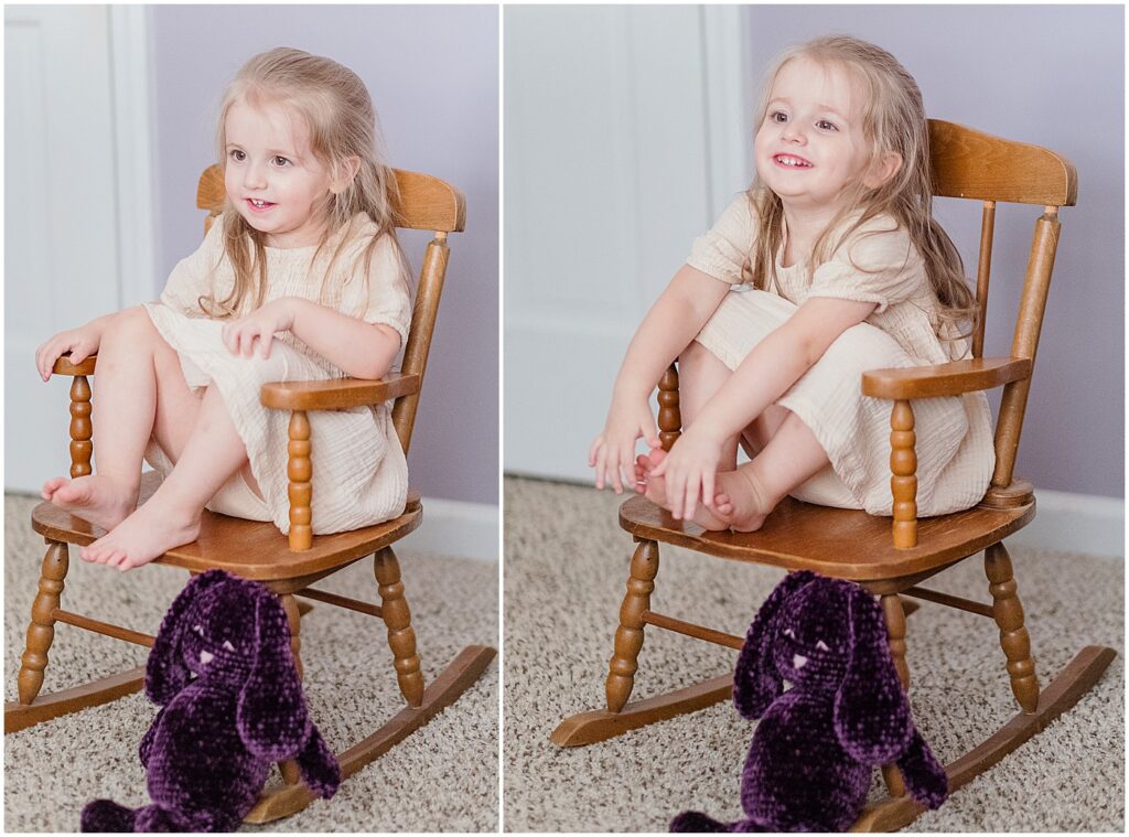 little girl in toddler rocking chair with purple bear