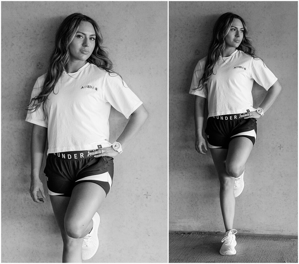 black and white images of fitness coach in workout gear leaning against a wall