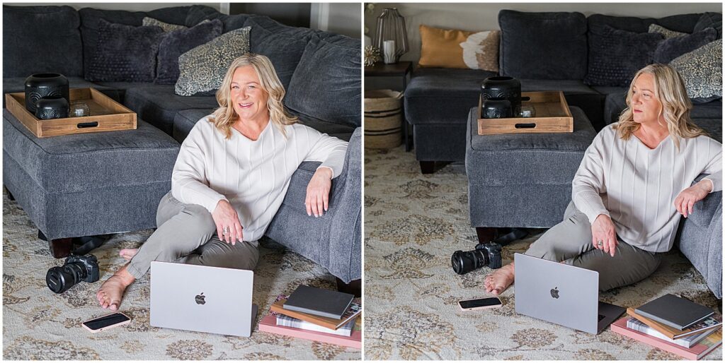 photographer sitting behind her laptop on the living room floor