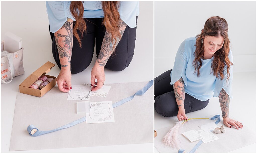 photographer putting invitations into flat lay on photography branding session