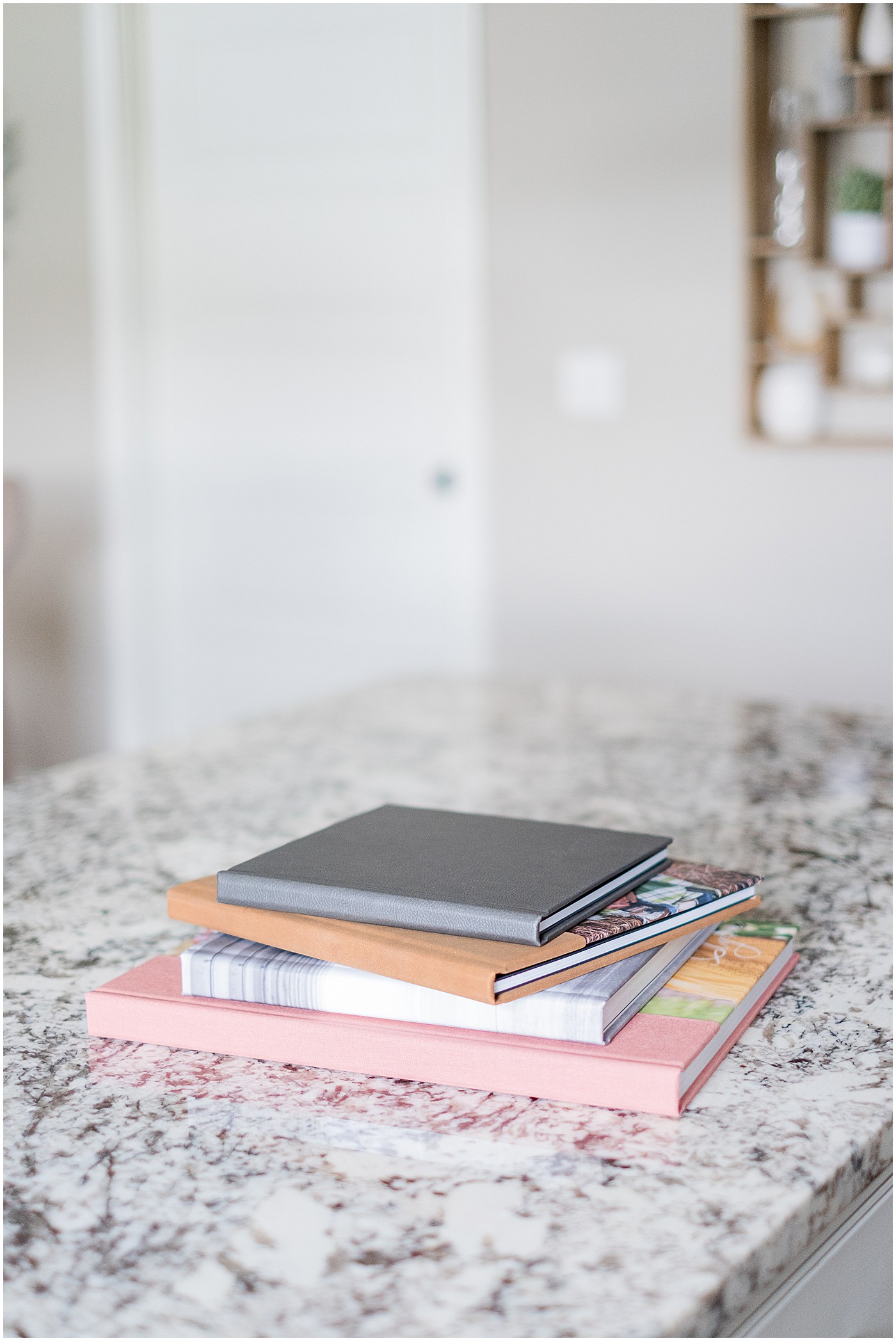 stock image of photo albums in a photography branding session