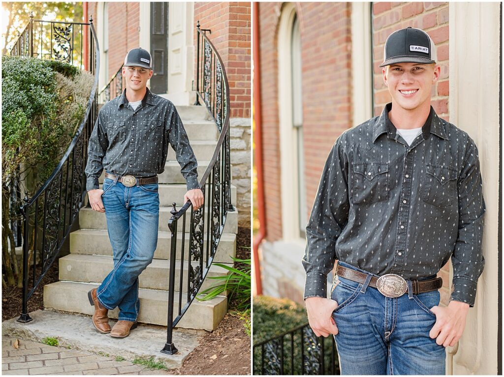 senior boy standing on steps, holding on to rail