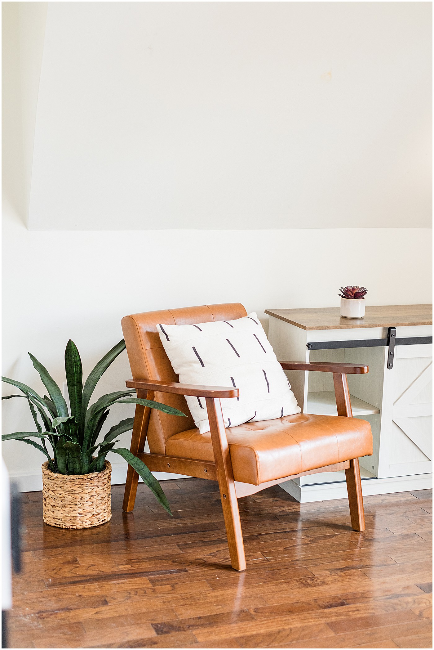 a beautiful tan leather chair that would be perfect for branding photos