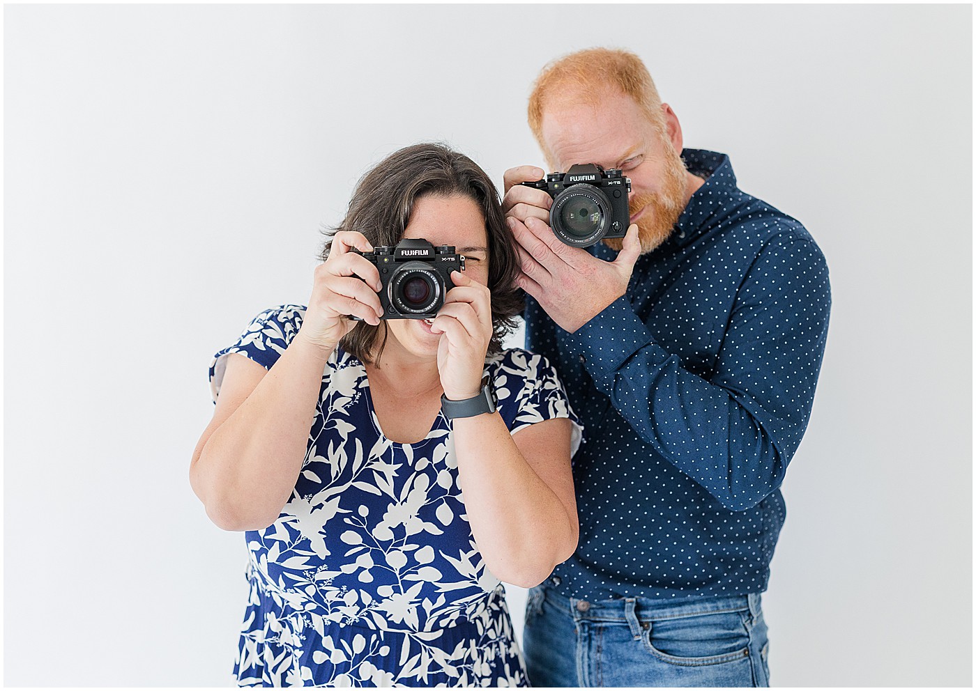 Kevin and Renee, KY branding photographers, each behind the camera